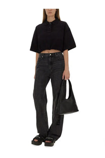 Black leather tote bag with minimalist design and single handle from alexanderwang women’s deconstructed polo black collection