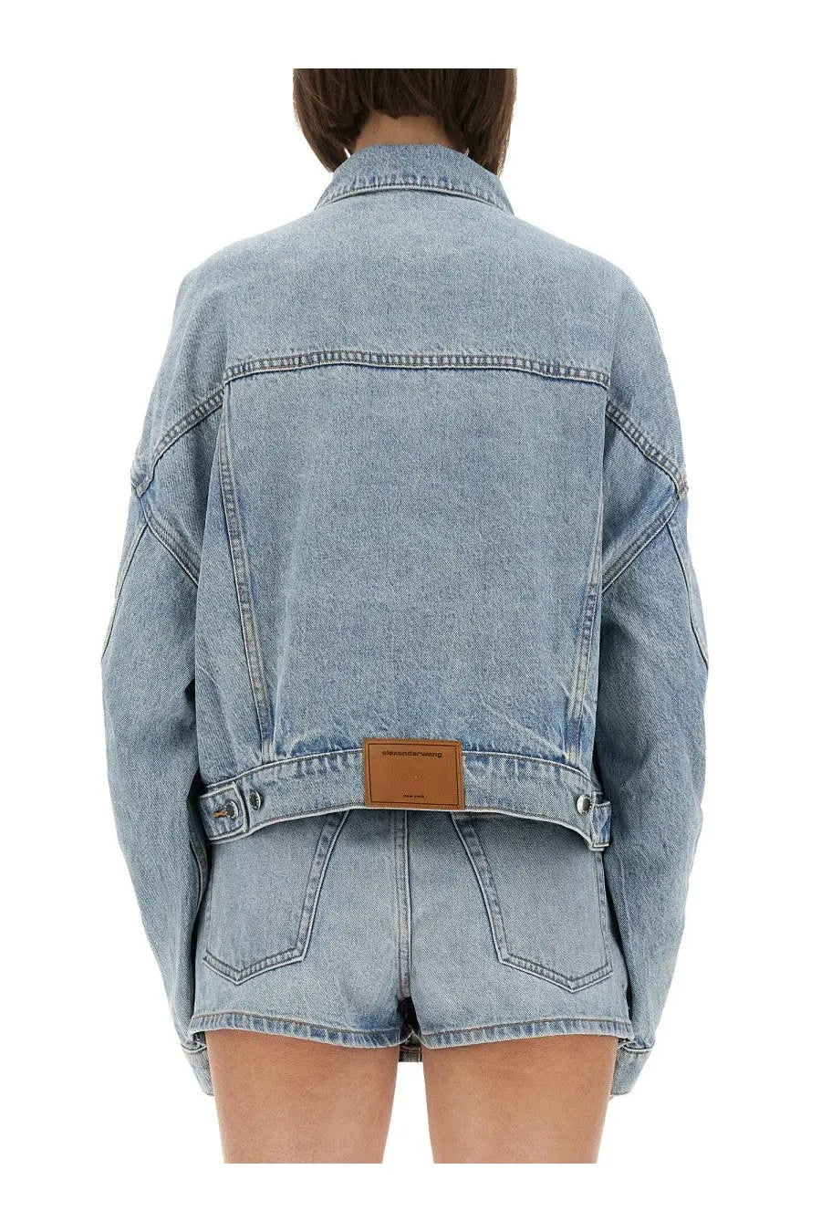 Alexanderwang women’s light-wash denim clip on trucker jacket with classic collar and brown leather patch waistband
