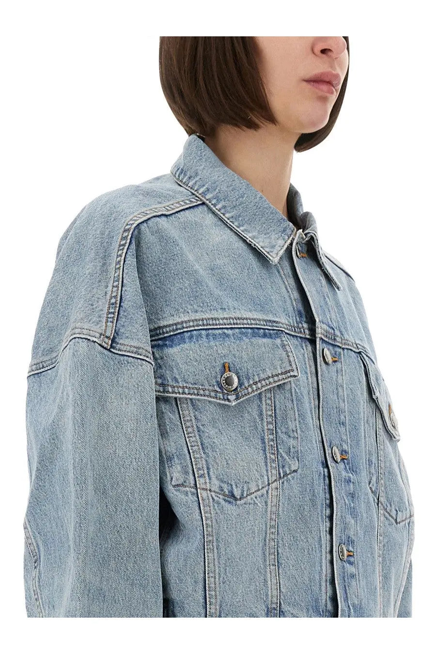 Alexanderwang women’s light-wash denim clip on trucker jacket with button front and chest pockets in blue