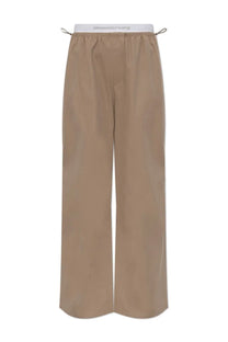 Alexanderwang women’s beige wide-leg double layer pants with white elastic waistband featuring alexanderwang logo