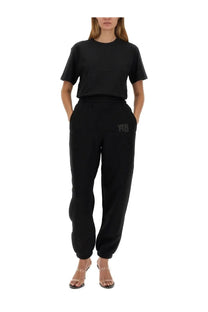 Black cotton joggers with a subtle embroidered logo on the left thigh from alexanderwang women’s essential shirt black collection