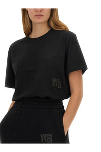 Alexanderwang women’s essential black short-sleeved t-shirt with subtle dark gray wang logo on left chest