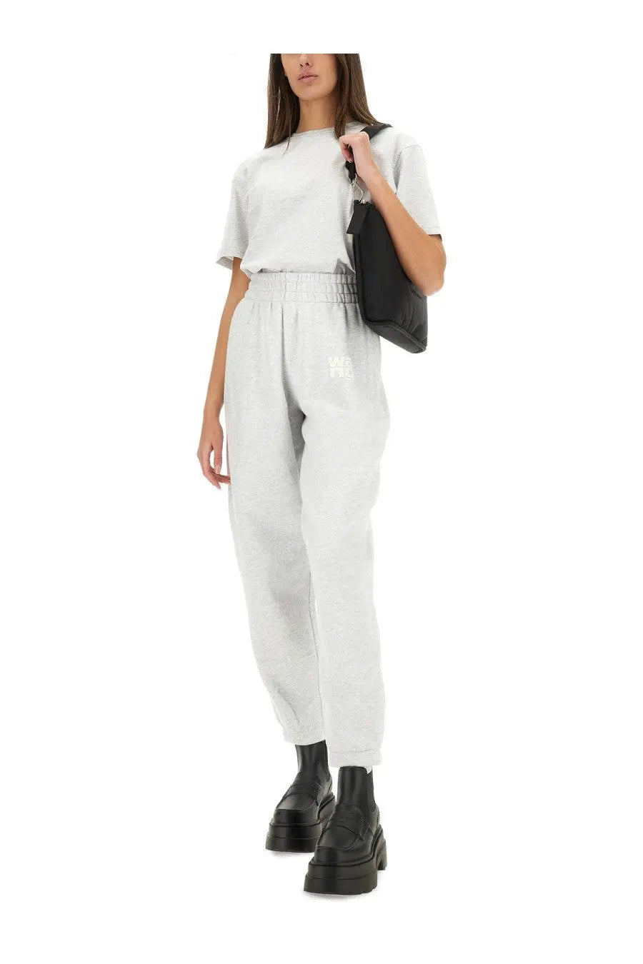 Alexanderwang women’s light gray sweatpants with subtle embroidered logo on thigh and elastic cuffs