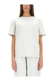 Alexanderwang women’s essential shirt grey is a soft heathered light gray cotton t-shirt with a subtle embroidered logo