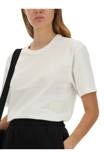 Alexanderwang women’s essential white cropped t-shirt with subtle light-colored wan logo embroidered on lower left side