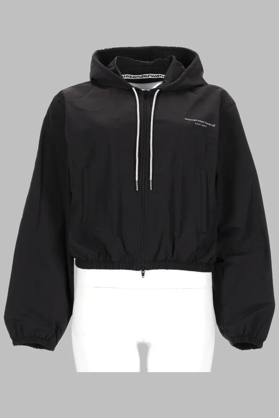 Black alexander mcqueen cropped hooded jacket with white zipper pulls and subtle brand embroidery for women