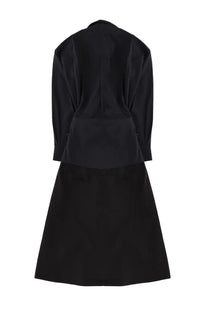 Alexanderwang women’s long wrap dress black shown from the back with a black satin blazer and matching skirt