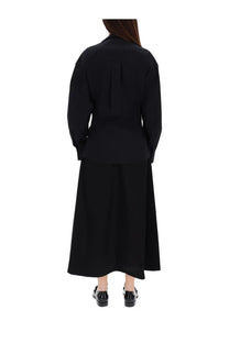Alexanderwang women’s long wrap dress black shown from back with structured pleated blouse and matching skirt