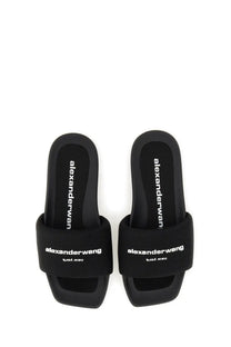 Black alexanderwang women’s nylon slide sandals with white branding on strap and insole in black color