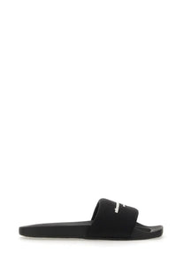 Black rubber slide sandal with textured strap and silver balenciaga logo from alexanderwang women’s nylon aw sandal black