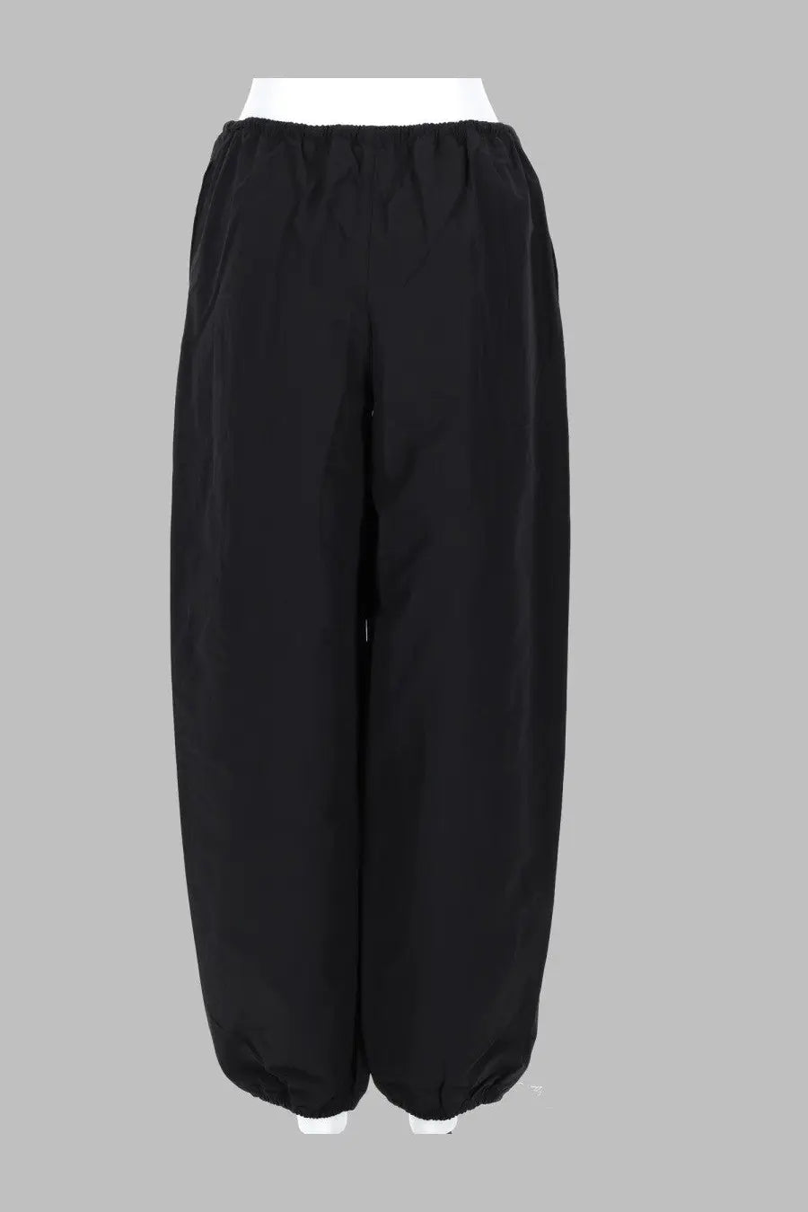Black loose-fitting tapered pants with elastic waistband from Alexander Wang womens pantalone track con