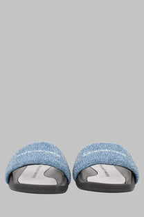 Alexanderwang women’s sandalo slide in denim blue with blue textured fabric straps black sole and white insole