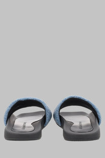 Alexanderwang women’s sandalo slide in denim blue with blue denim texture and black rubber soles