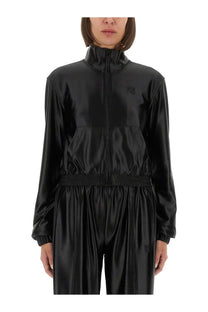 Alexanderwang women’s black satin faille tracksuit with high collar and elastic waistband shown from the back