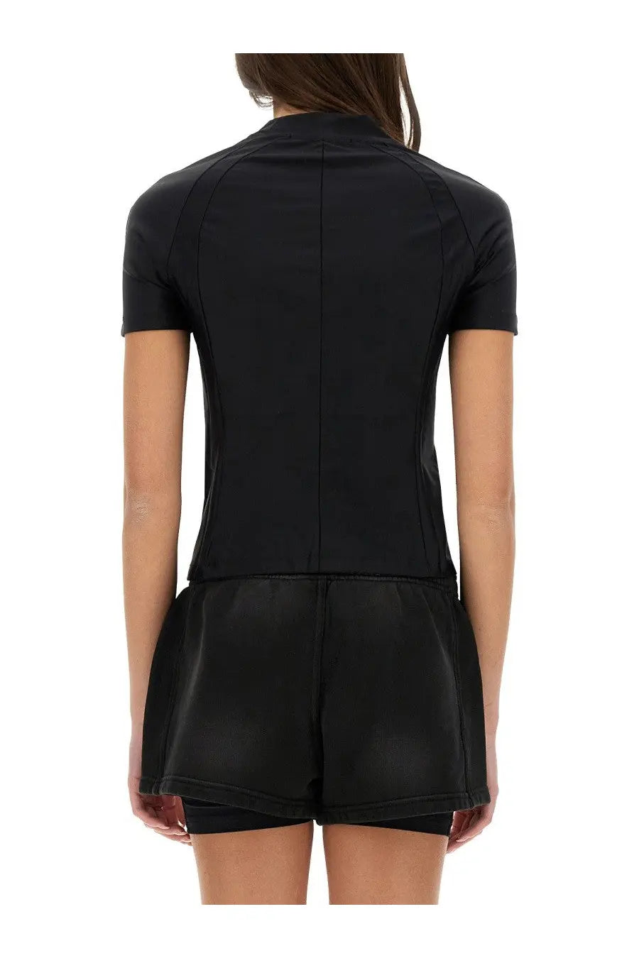 Back view of alexanderwang women’s black short-sleeved rash guard with high collar and seam detailing