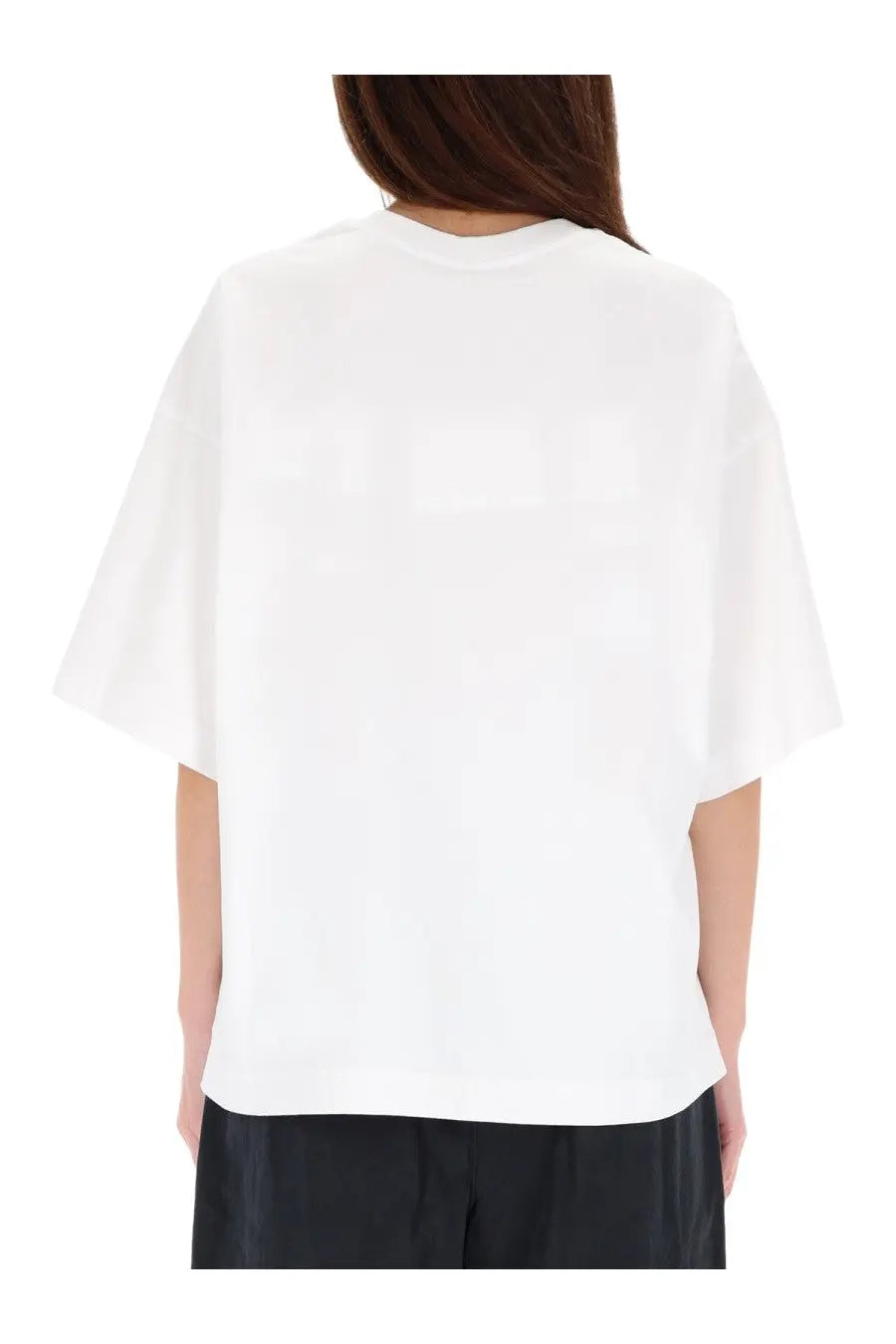 White oversized short-sleeved t-shirt with relaxed fit and crew neckline in alexanderwang women’s shirt black product line