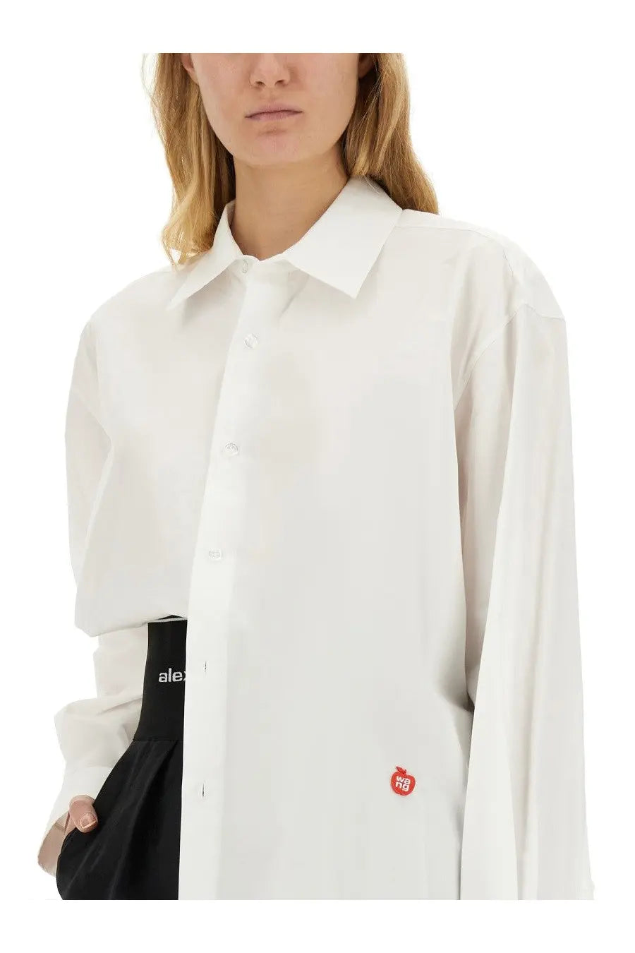 Alexanderwang women’s white oversized button-down shirt with a small red apple logo on the lower left side