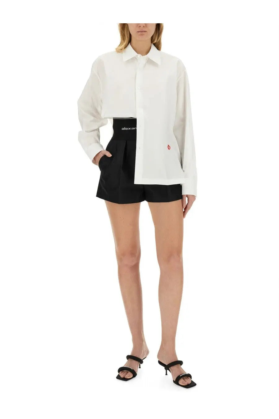 Alexanderwang women’s white oversized button-up shirt with black waistband and subtle red logo patch