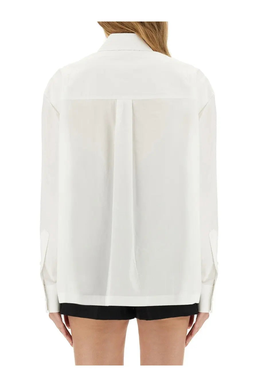 Alexanderwang women’s white satin blouse with subtle sheen and black trim at the hem front side visible