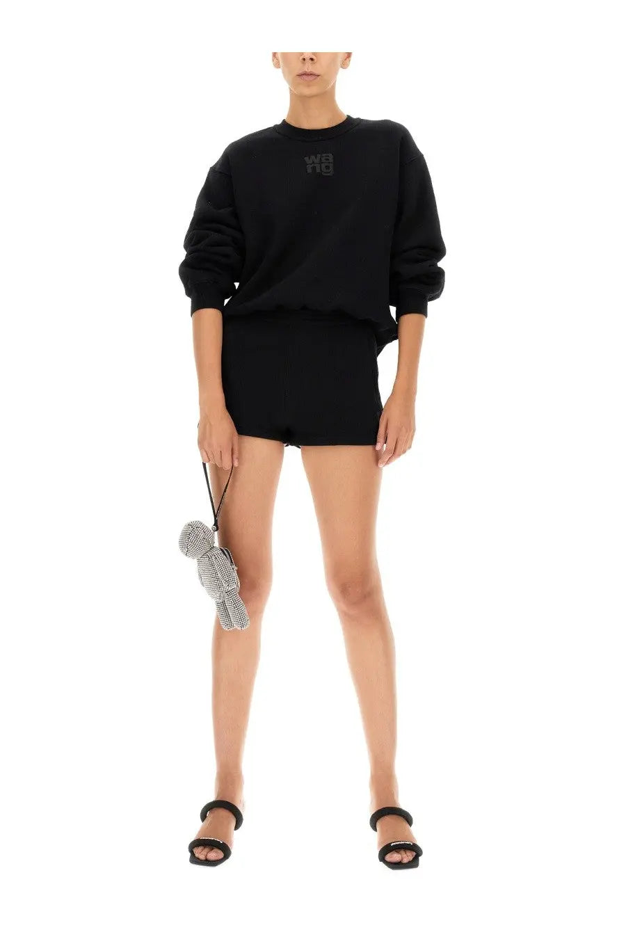 A sparkling silver rhinestone-encrusted bear-shaped clutch with black strap for alexanderwang women’s shorts black