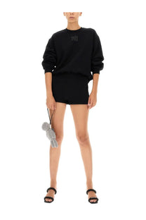 A sparkling silver rhinestone-encrusted bear-shaped clutch with black strap for alexanderwang women’s shorts black