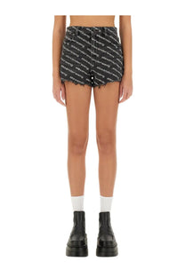 Alexanderwang women’s grey denim shorts with repeating alexanderwang logo print across the fabric front view