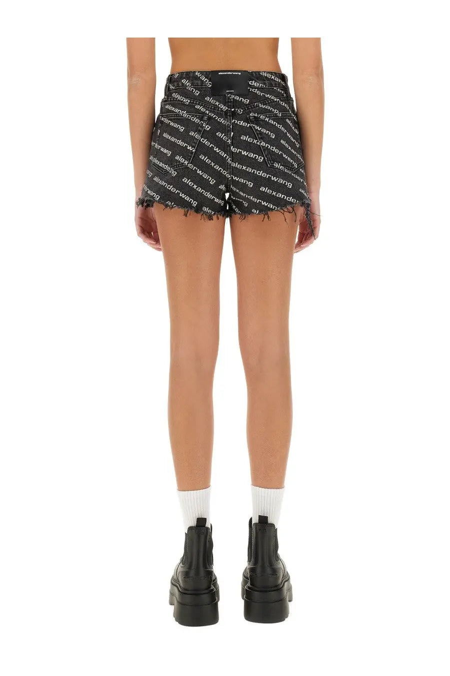 Alexanderwang women’s grey denim shorts with frayed hem and repeating white logo print on black fabric