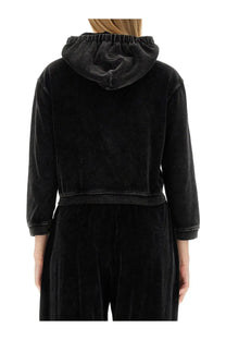 Black velvet cropped hoodie with elasticated hood and ribbed cuffs from alexanderwang womens velour sweatshirt black