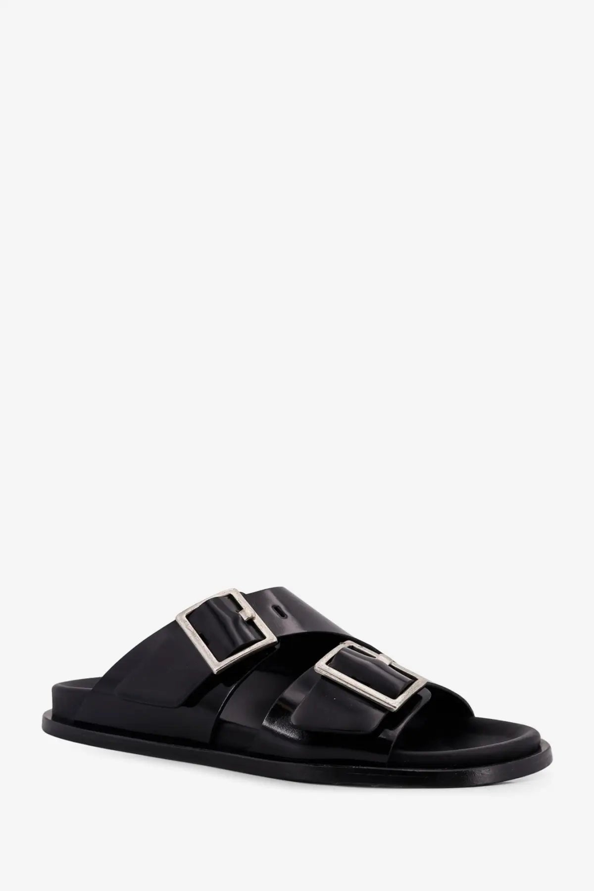 Alohas women’s Alba low leather slide sandal in black with two silver-toned rectangular buckle straps