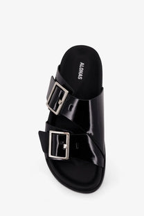 Alohas women’s alba low black leather slide sandal with two silver-toned buckle straps