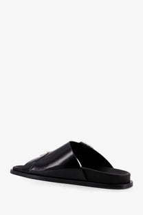 Alohas women’s alba low black leather slide sandal with sleek minimalist design and small metallic accent on strap