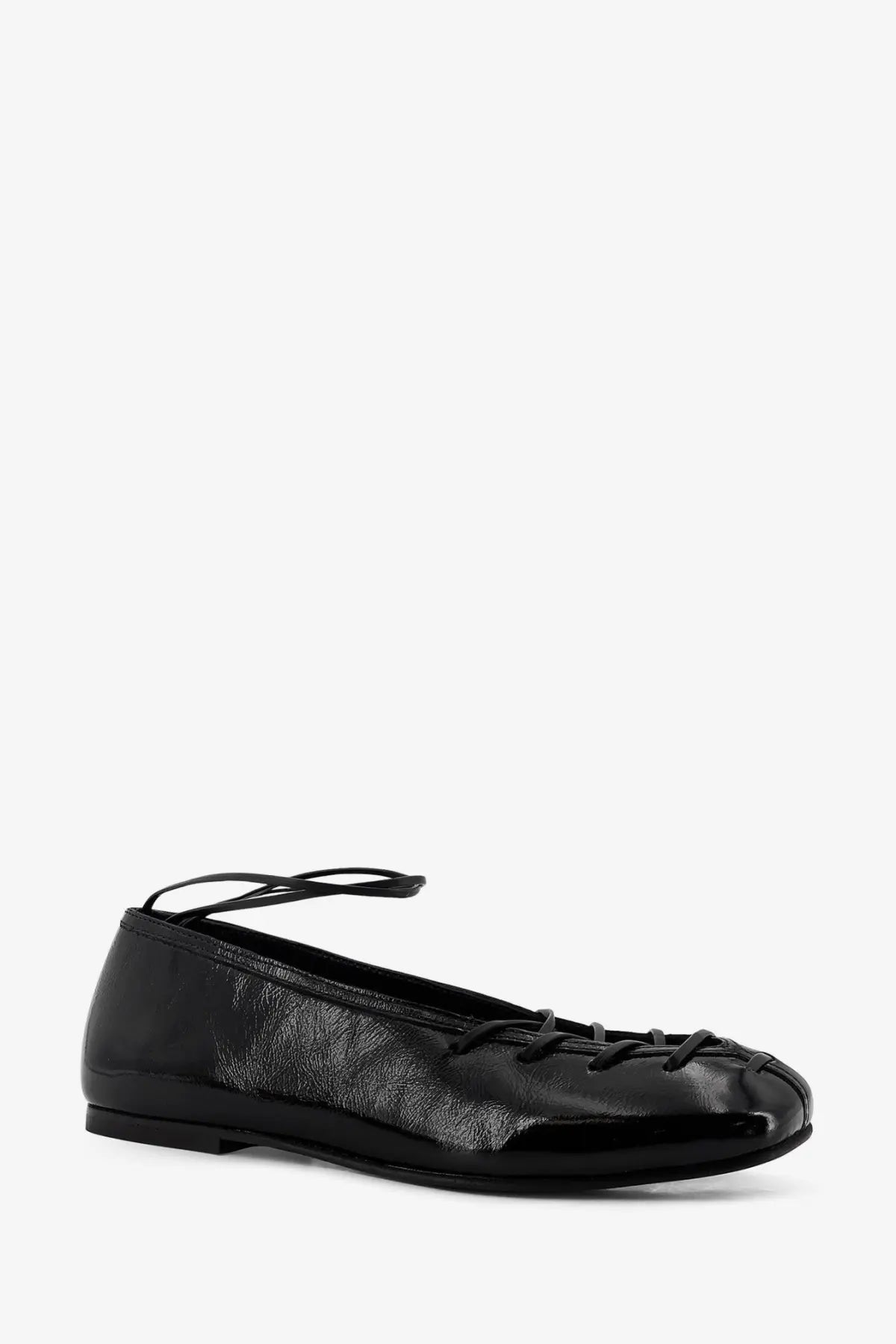 Alohas women’s bumi patent leather ballet flat in black with lace-up detailing and a thin ankle strap