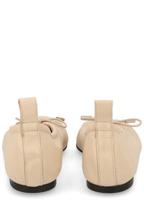 Beige leather aloha women’s dancer rosalind yellow ballet flats with small bow at back and black soles back view