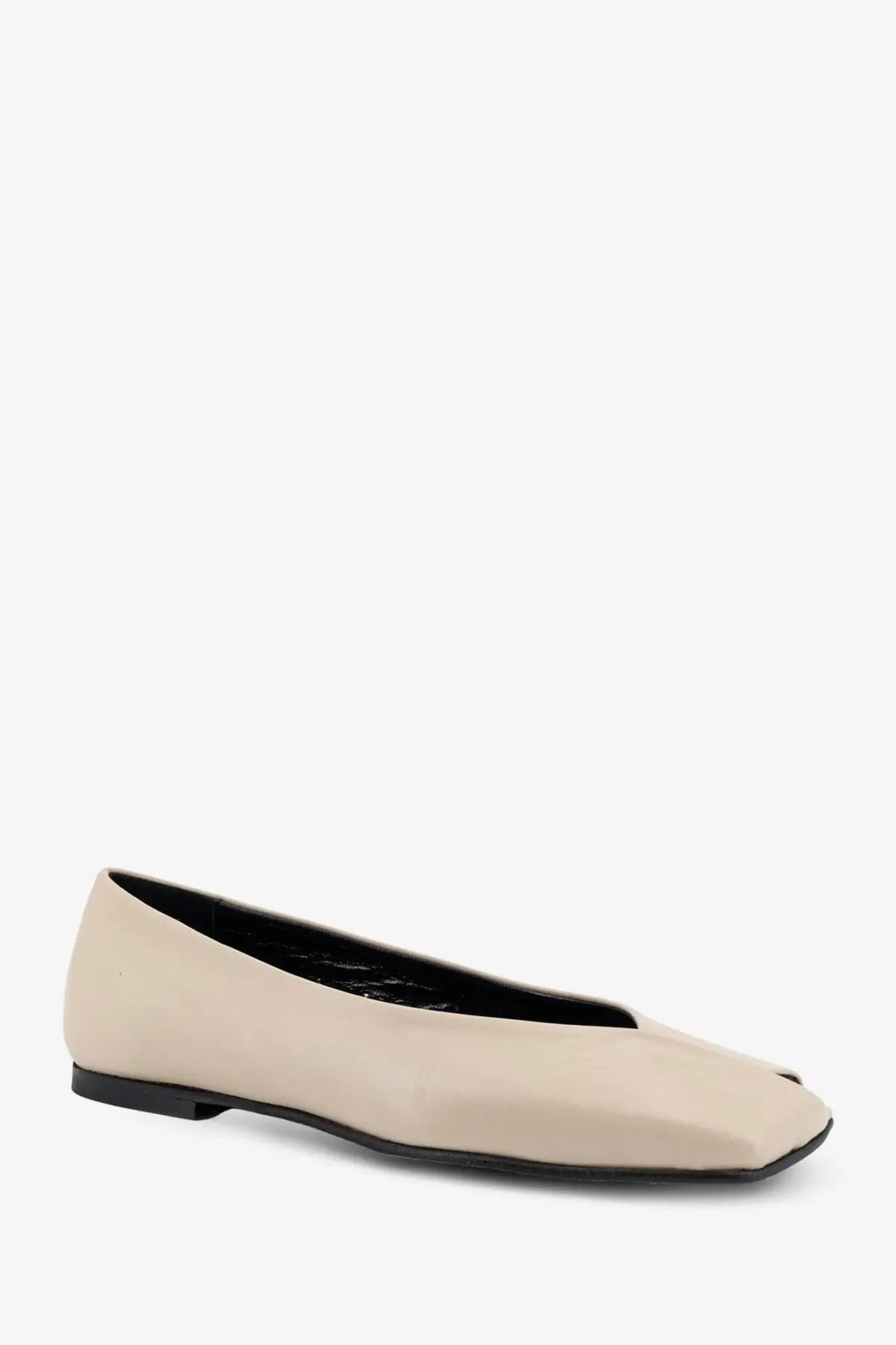 Alohas women’s Katia leather ballerinas in beige with sleek minimalist design and black sole