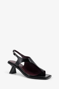 Alohas women’s mahina black leather sandals with square toe low block heel and adjustable ankle strap visible from back