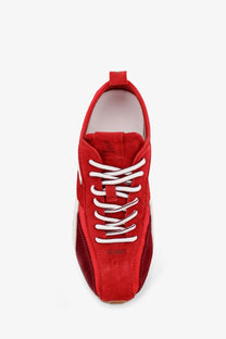 Alohas women’s red nylon and suede sneaker with white laces and a contrasting dark red heel shown from the back