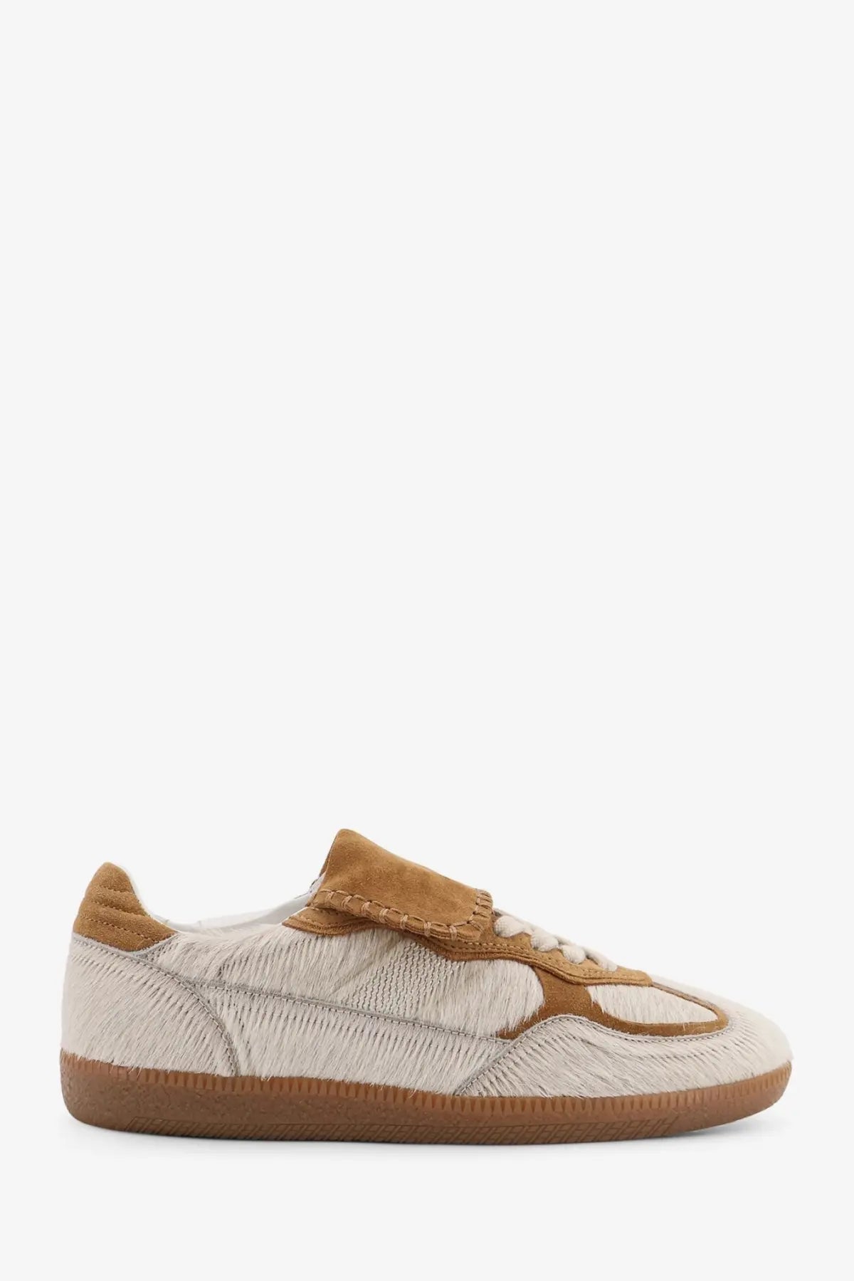 Cream-colored suede and textured white leather low-top sneaker with tan accents from Alohas women’s pony skin collection