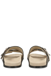 Alohas women’s Sandalo Alba beige slide sandals with black leather straps and silver buckle details