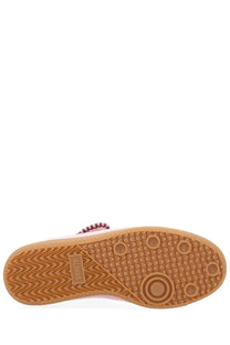 Alohas women’s pink suede slip-on sneaker with tan rubber sole featuring wavy tread and circular grip dots