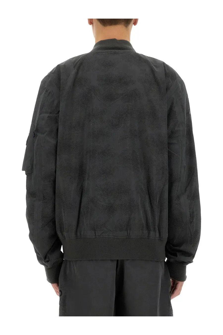 Alpha industries men’s laser cut bomber jacket in black with subtle textured fabric pattern