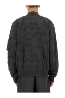 Alpha industries men’s laser cut bomber jacket in black with subtle textured fabric pattern