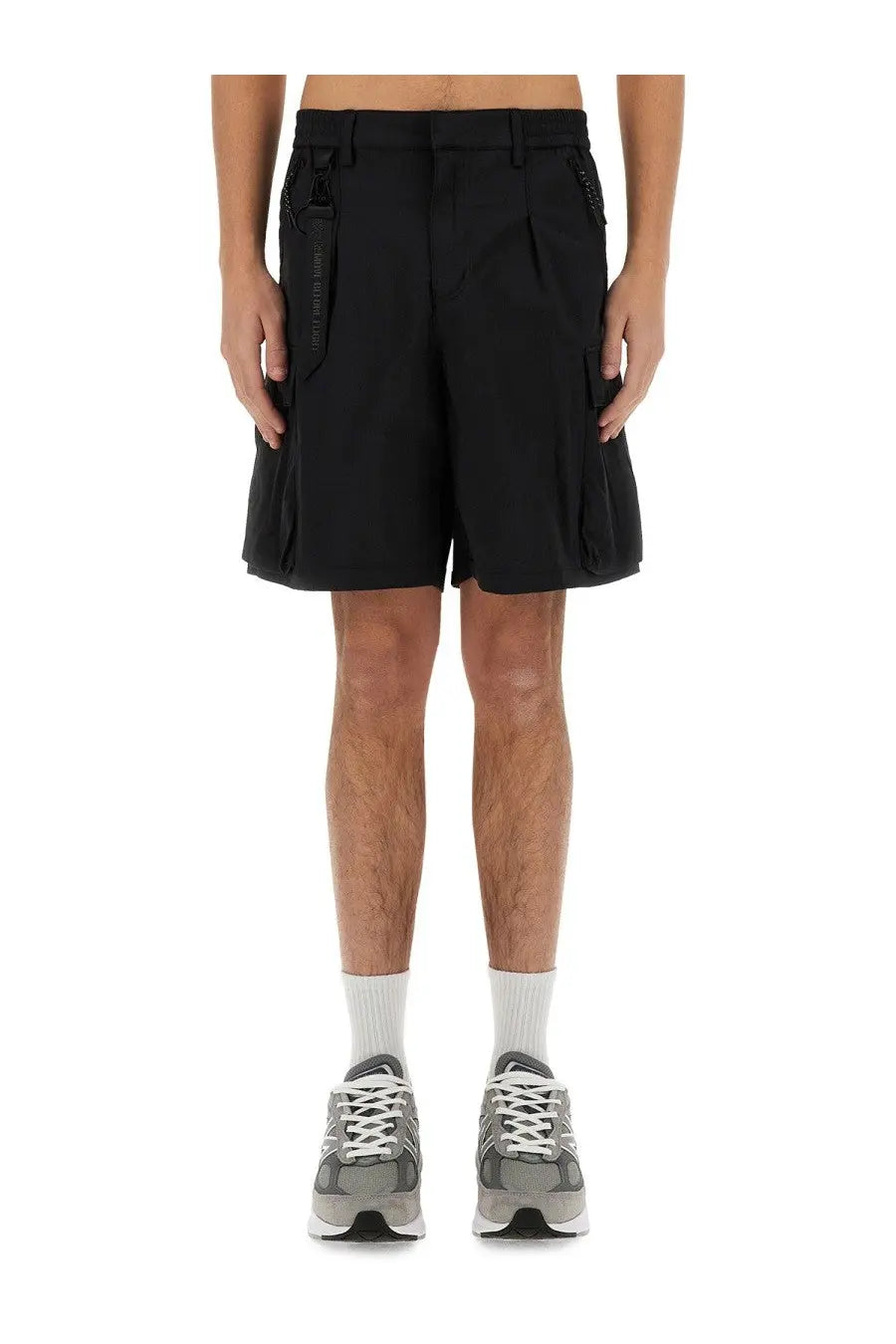 Alpha Industries men’s black cargo shorts with multiple pockets and a sleek modern design for utility use