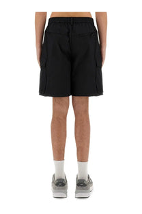 Alpha industries men’s black cargo shorts with drawstring waist and multiple side pockets for utility use