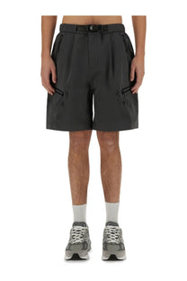 Alpha Industries men’s short laser cut grey cargo shorts with multiple side pockets and a belt looped through the waistband