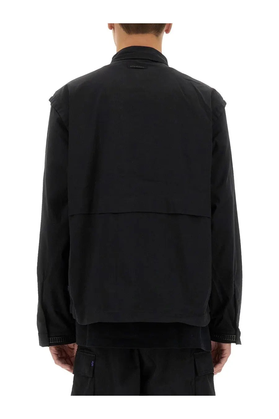 Alpha industries men’s utility overshirt black featuring a black minimalist utility jacket with subtle stitching details