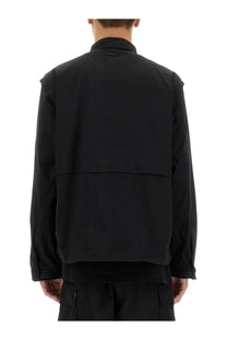 Alpha industries men’s utility overshirt black featuring a black minimalist utility jacket with subtle stitching details