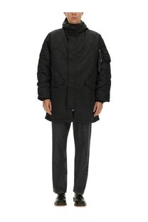 Alpha Industries unisex long bomber jacket in black with puffer style hood, front zipper, and patch pockets