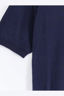 Navy blue short-sleeved knit polo shirt with ribbed cuffs made of cotton and silk blend by alpha-studio men