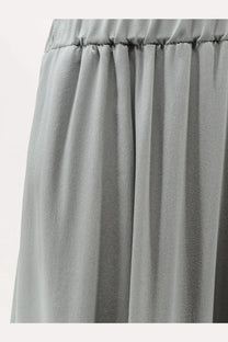 Alysi women’s balloon silk trousers in light gray with soft pleats and an elastic waistband