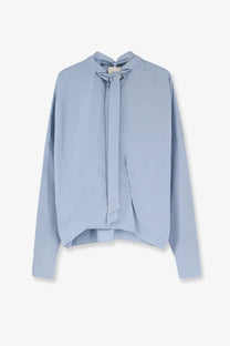 Alysi women’s cotton shirt cielo in soft light blue with flowing silhouette and delicate tie-neck detail